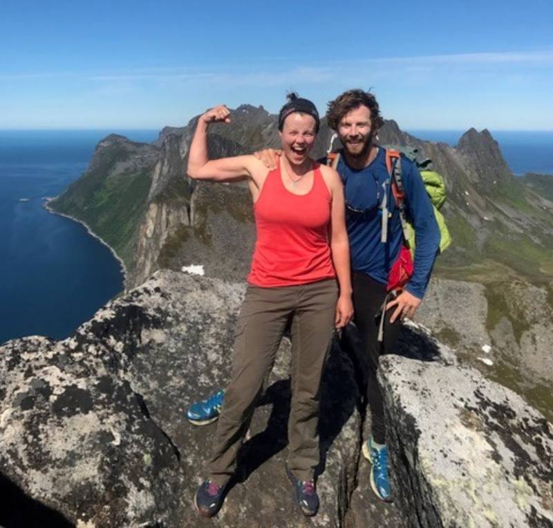 Melissa Smith (L) and Justin Smith (R) on Segla Peak in Norway during a kayaking adventure
