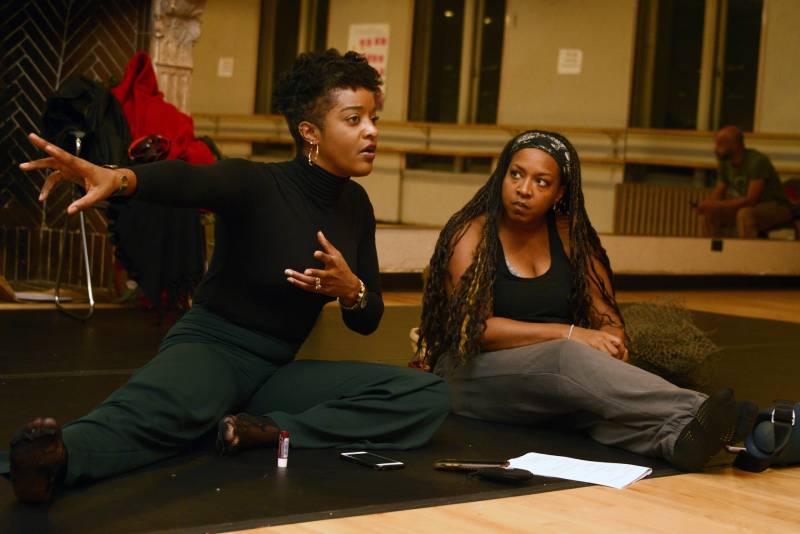 RyanNicole Peters, co-writer, co-director and lead dramatist (left) sits with Rozz Nash, executive director of The People’s Conservatory, during a rehearsal at Malonga Casquelourd Center for the Arts in Oakland on Dec. 5, 2019.