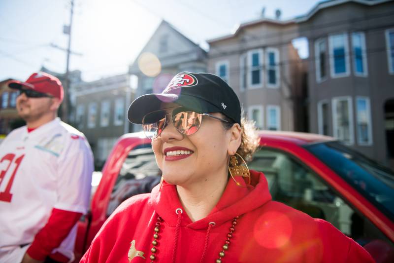 Martha Carrasco on Alabama Street in the Mission before the Super Bowl on Sunday. She and about 30 friends and family who all grew up nearby have been getting together for games at the Carrasco House since 2012.
