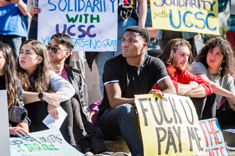 Students rally at Sproul Plaza on UC Berkeley campus in support of striking UC Santa Cruz graduate students and to demand their own cost of living adjustment.
