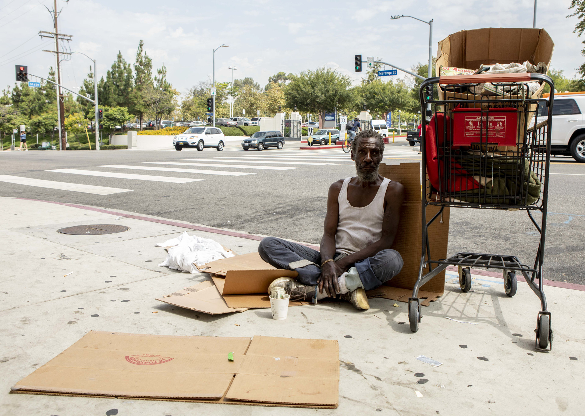 Will, who provided his first name only, sits on the sidewalk across the street from LAC+USC Medical Center to panhandle for money until he has enough to go to McDonalds down the block. Will has been homeless since he arrived in Los Angeles from Chicago in 1982. 