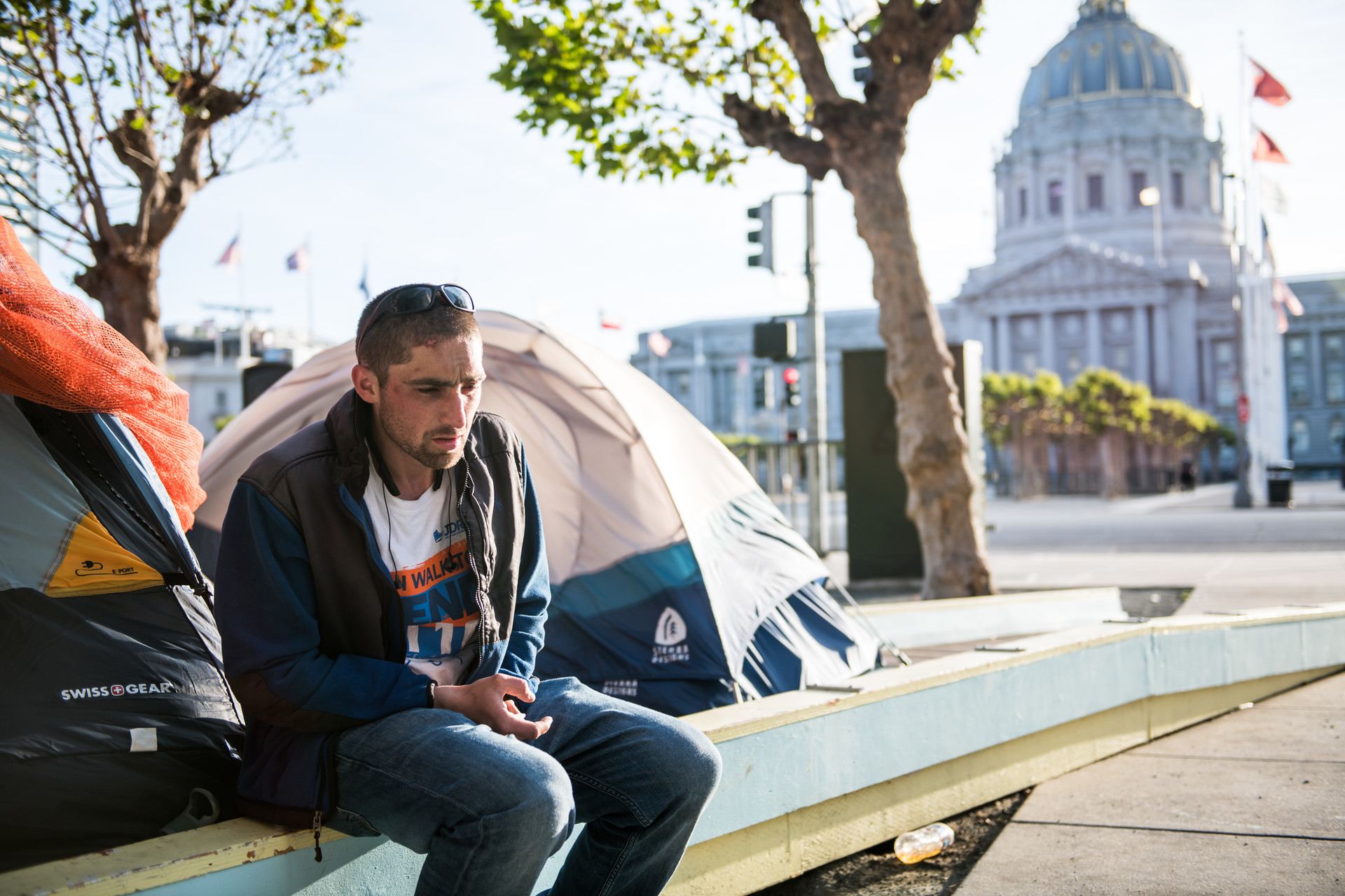 Brandon Conrad at a tent encampment where he currently lives on Fulton Street near City Hall on May 5, 2020.