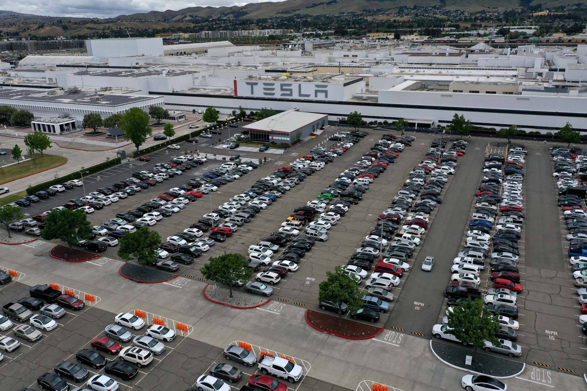 An aerial view of Tesla's plant in Fremont on May 12, 2020, the day after CEO Elon Musk declared he had opened the facility "against Alameda County rules" that shut down production in late March. Local officials described the reopening as ramping up "minimum basic operations." The company is expected to be in full production this week. Justin Sullivan/Getty Images