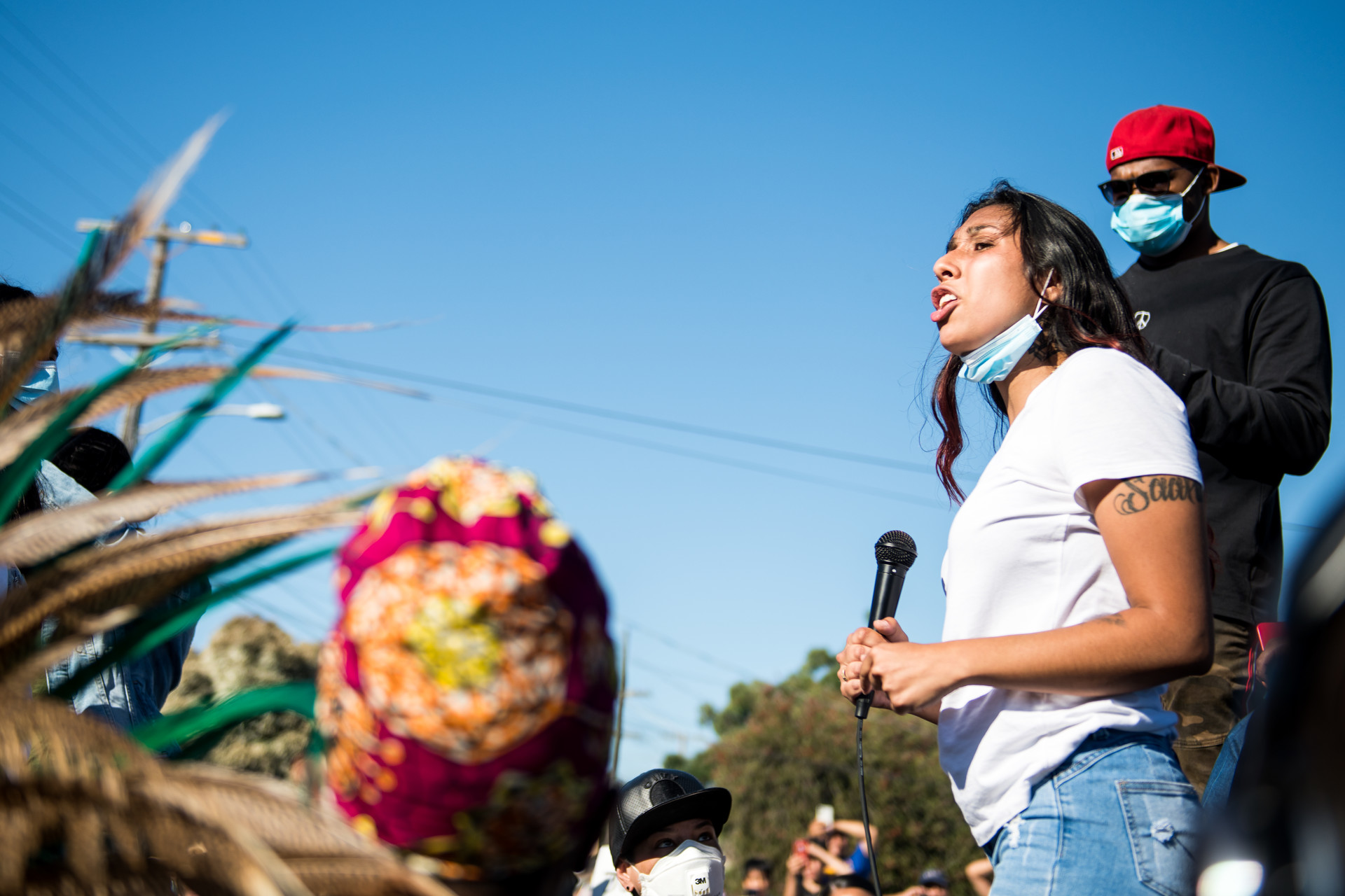 Erik Salgado’s sister, Amanda Majail-Blanco, speaks during a march on June 8, 2020 in Oakland for her brother who was shot and killed by California Highway Patrol officers on June 6.