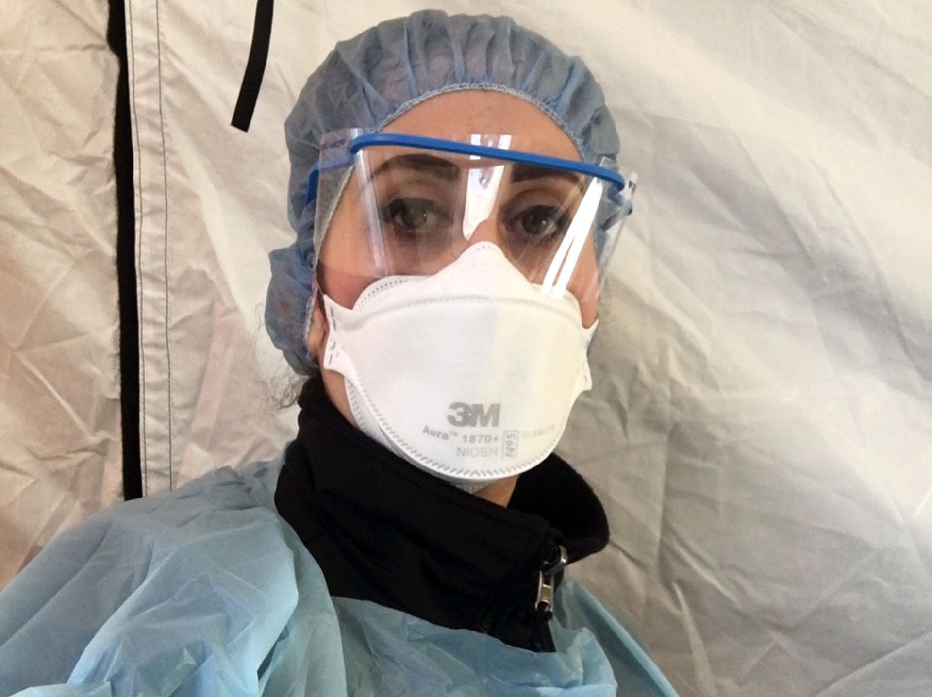 Ameneh Moghaddam dressed in PPE for work as a COVID-19 tester at the Contra Costa Regional Medical Center in Martinez.