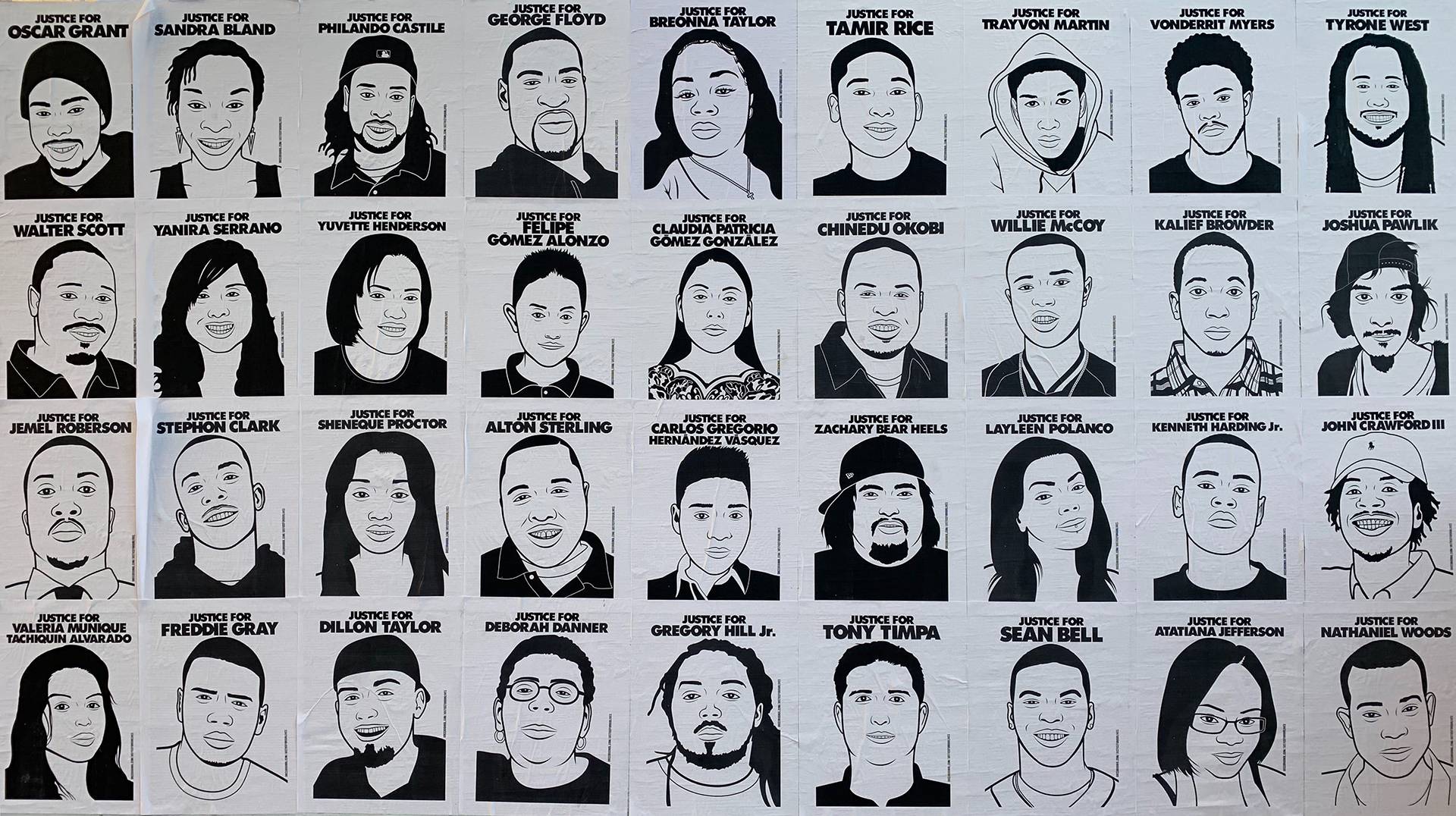 Portraits by the Oakland artist Oree Originol of three dozen people slain, mostly by law enforcement officers, were on display at protests in Oakland last week. Erin Baldassari/KQED
