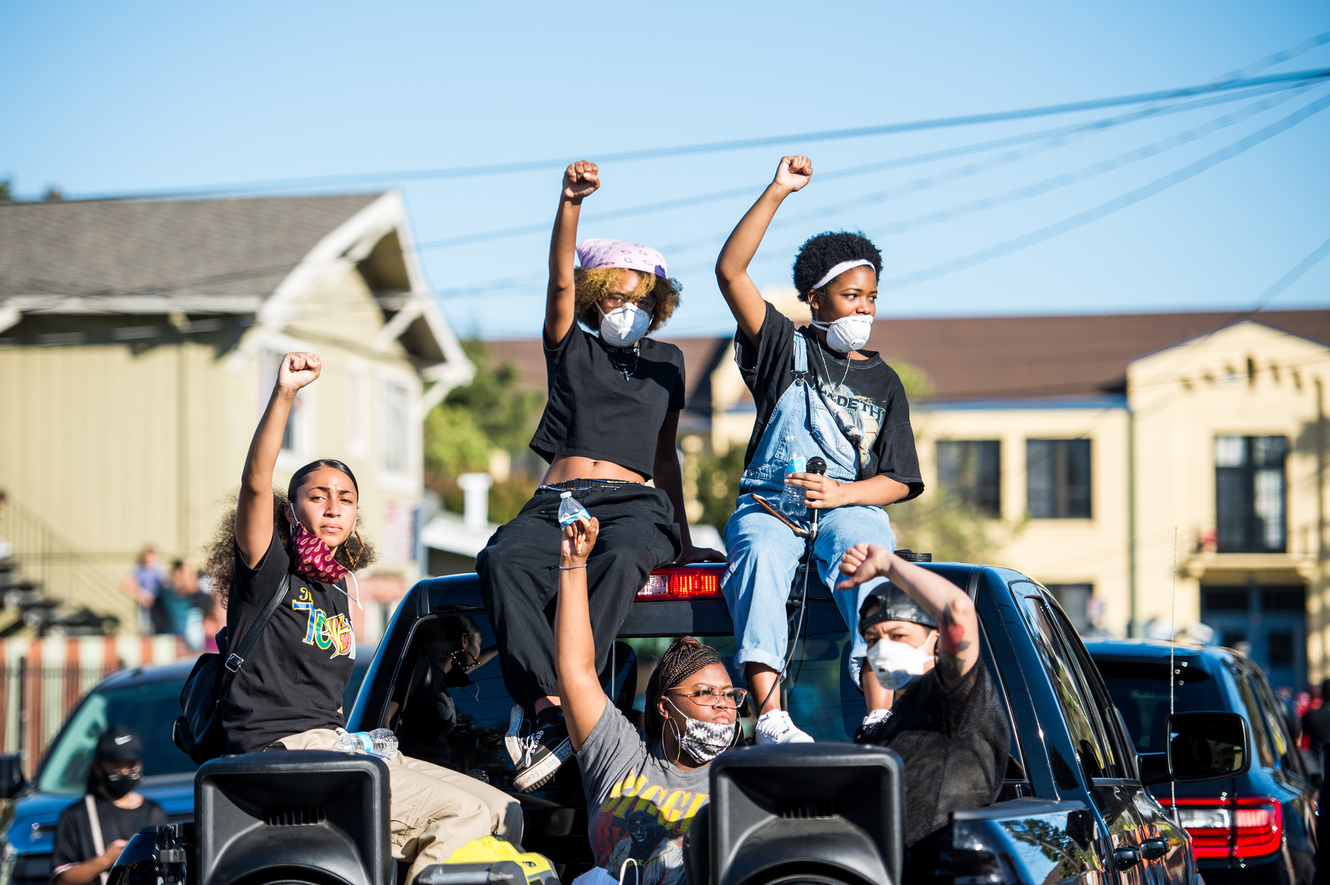 Isha Clarke (left) and other members of Oakland Black Youth Activists take part in a march for Erik Salgado, who was shot and killed by California Highway Patrol officers on June 6.