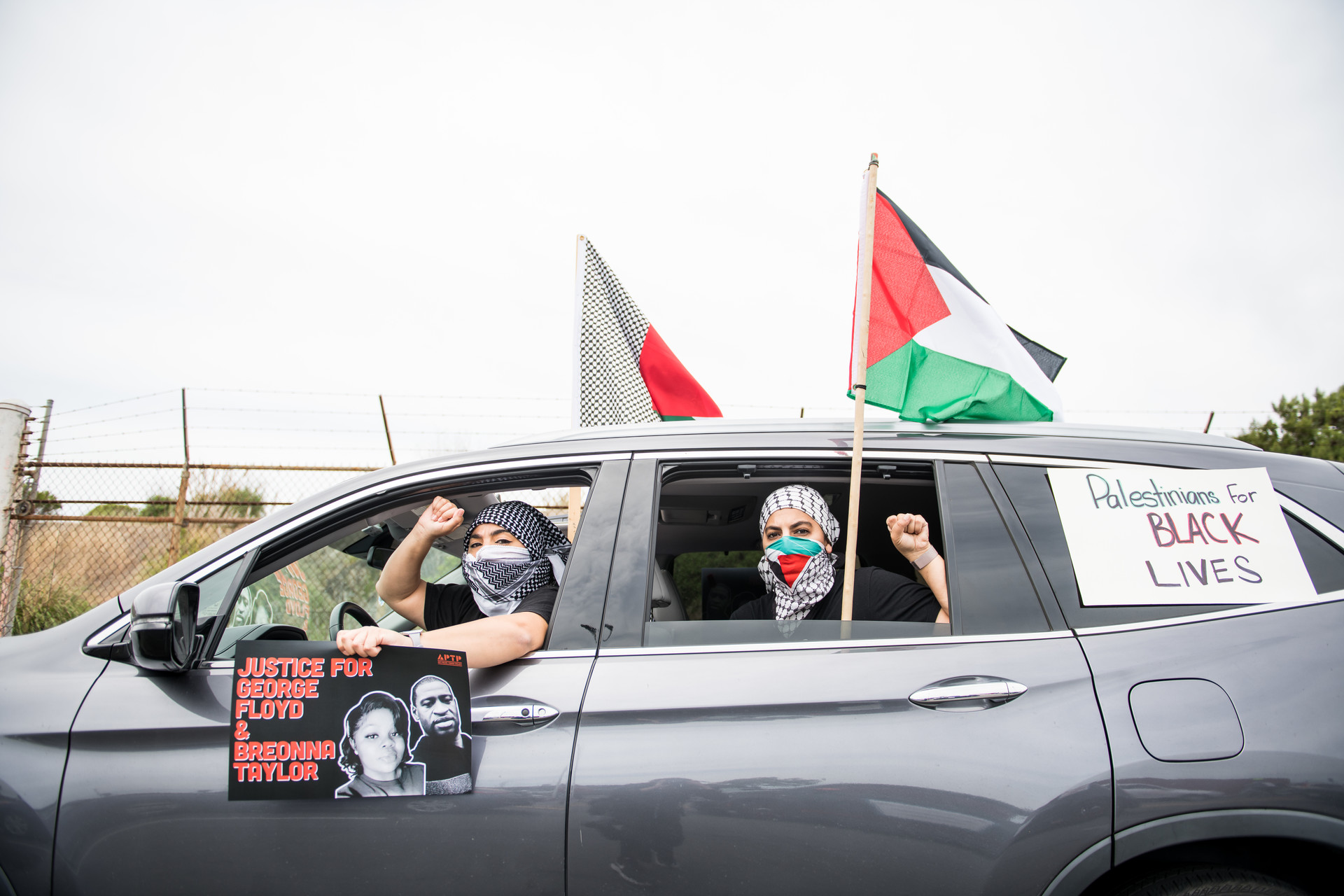Members of the Palestinian Youth Movement joined the thousands of vehicles that lined up for miles from the Port of Oakland to Lake Merritt on Sunday afternoon.