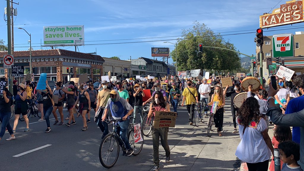 A five-block-long line of marchers moved down Broadway Monday afternoon from Oakland Technical High School toward City Hall.