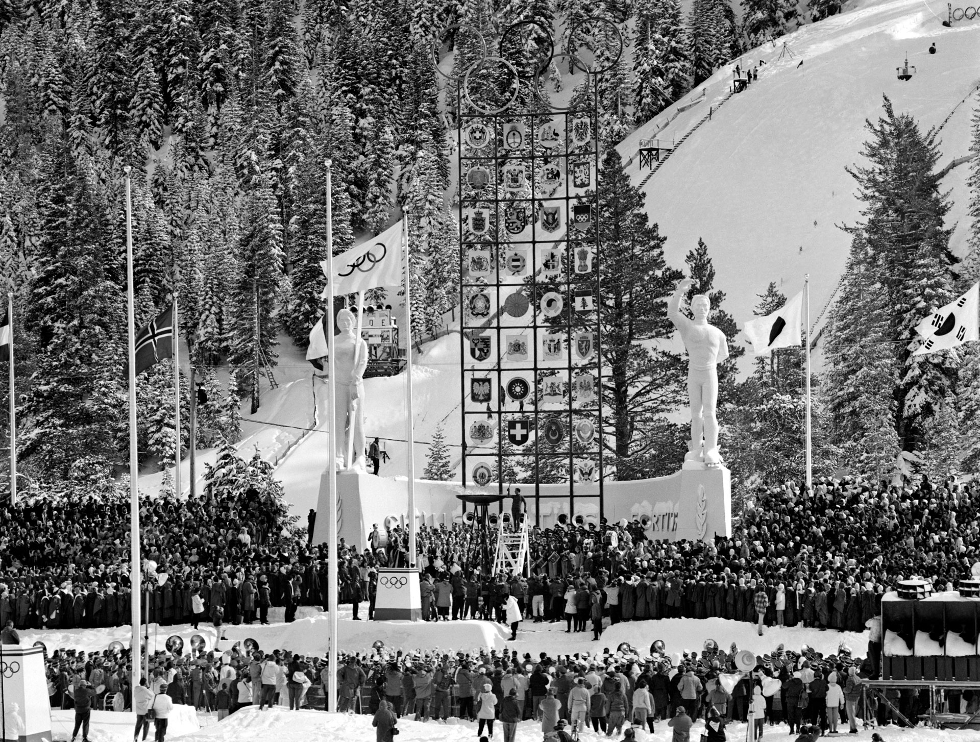 The Olympic flame is lit during the opening ceremony of the 1960 Winter Olympic Games in Squaw Valley.