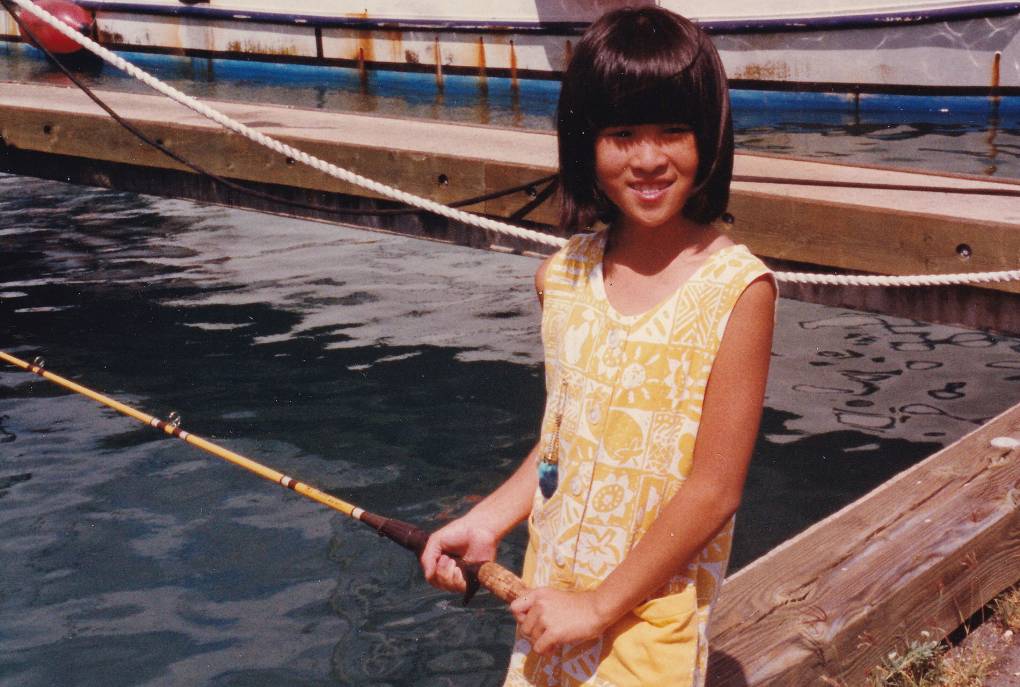 Jeannie Pham, who grew up translating and interpreting for her parents, at age 9. Courtesy Jeannie Pham