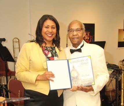 San Francisco Mayor London Breed presented Earl Gage Jr. with a Certificate of Honor during her tenure as District 5 supervisor.