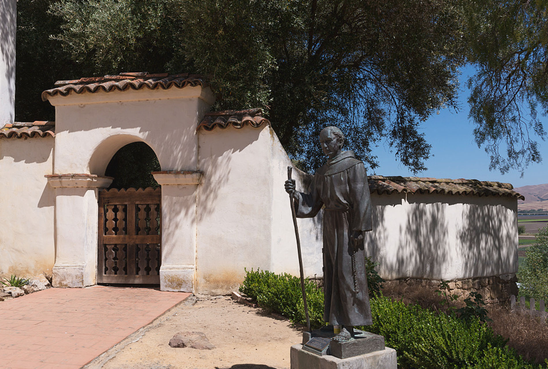 A statue of Father Junípero Serra at Old Mission San Juan Bautista in San Juan Bautista, San Benito County, California.