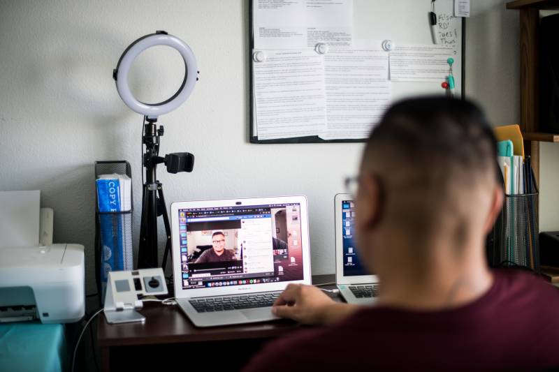 Philip Melendez at his home computer, where he hosts Facebook Live shows including the Parole Show and Re:Store Survivors Live, on July 25, 2020. These shows help inform formerly incarcerated people on a variety of topics.