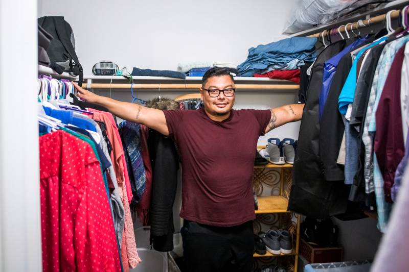 Philip Melendez in a walk-in closet in his home, which he says is larger than the cell he occupied at San Quentin State Prison. Often those cells house two people. 