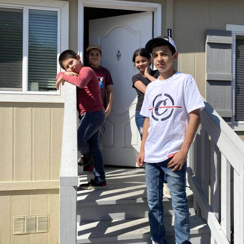 Adrian Avila and his younger siblings share one hot spot and two computers among them.