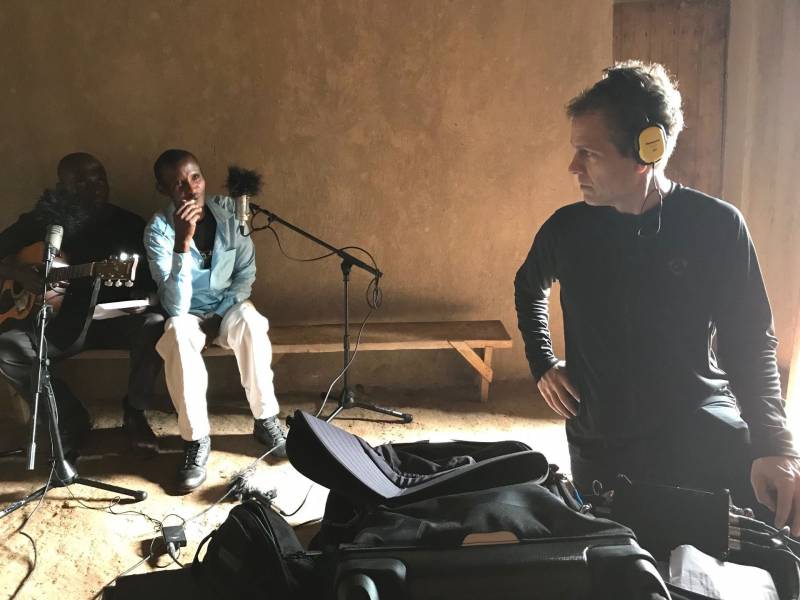 Ian Brennan working with "The Good Ones," a musical group in Rwanda.
