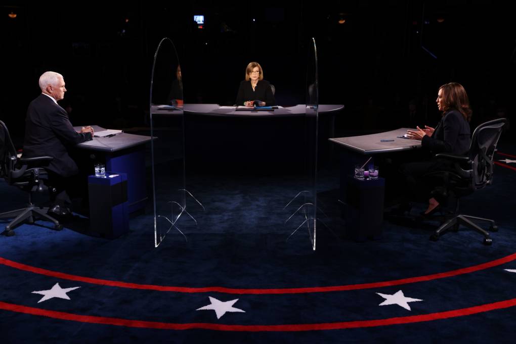 US Vice President Mike Pence (L), US Democratic vice presidential nominee and Senator from California, Kamala Harris (R), moderator Washington Bureau Chief for USA Today Susan Page (C), participate in the vice presidential debate in Kingsbury Hall of the University of Utah October 7, 2020 in Salt Lake City, Utah.  JUSTIN SULLIVAN/POOL/AFP via Getty Images