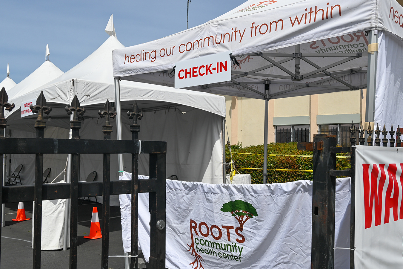 a Roots Community Health Center tent