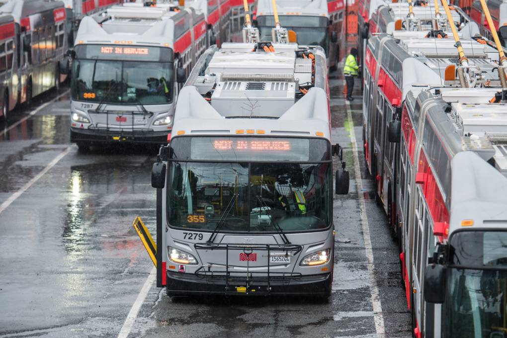 San Francisco Muni buses sit at a bus yard on Bryant and Mariposa streets in April 2020. Beth LaBerge/KQED