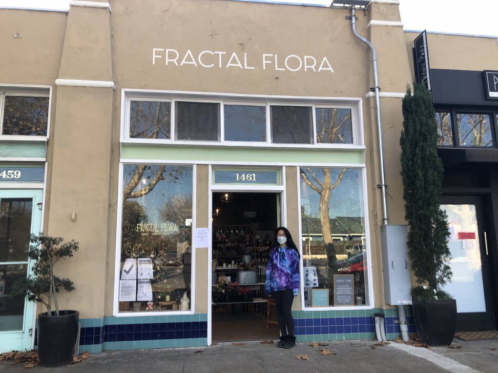 Yuri Kim stands outside her newly renovated store, Fractal Flora in San Jose. Kim has seen a boost in plant sales during the pandemic.