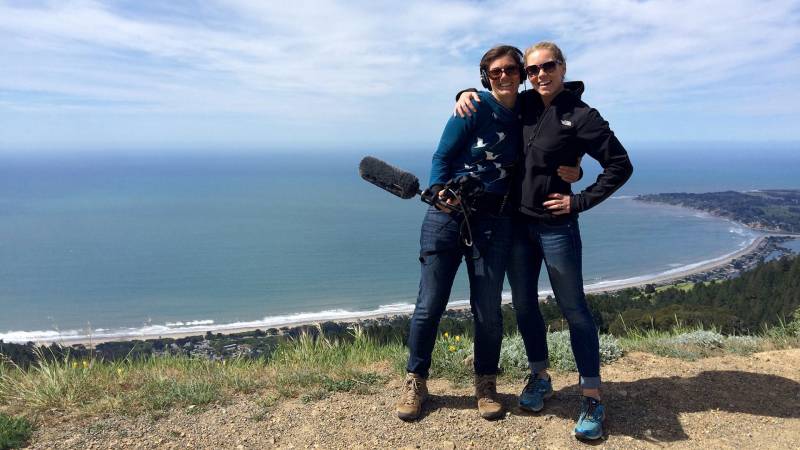 Katrina Schwartz (left) and Olivia Allen-Price (right) pose at an overlook on Mount Tamalpais while reporting the first Bay Curious story ever.