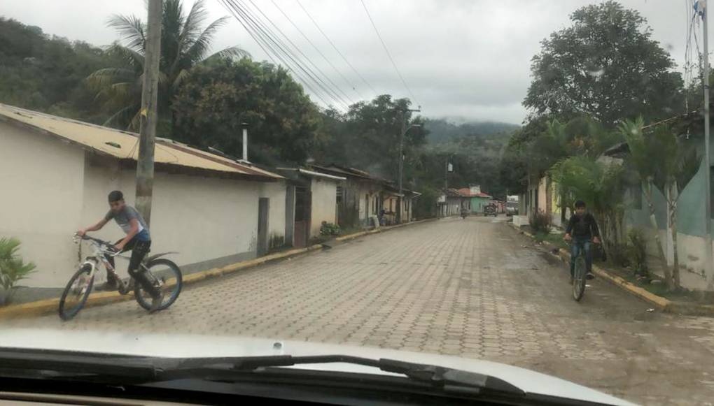 Small town in Honduras, view from car windshield