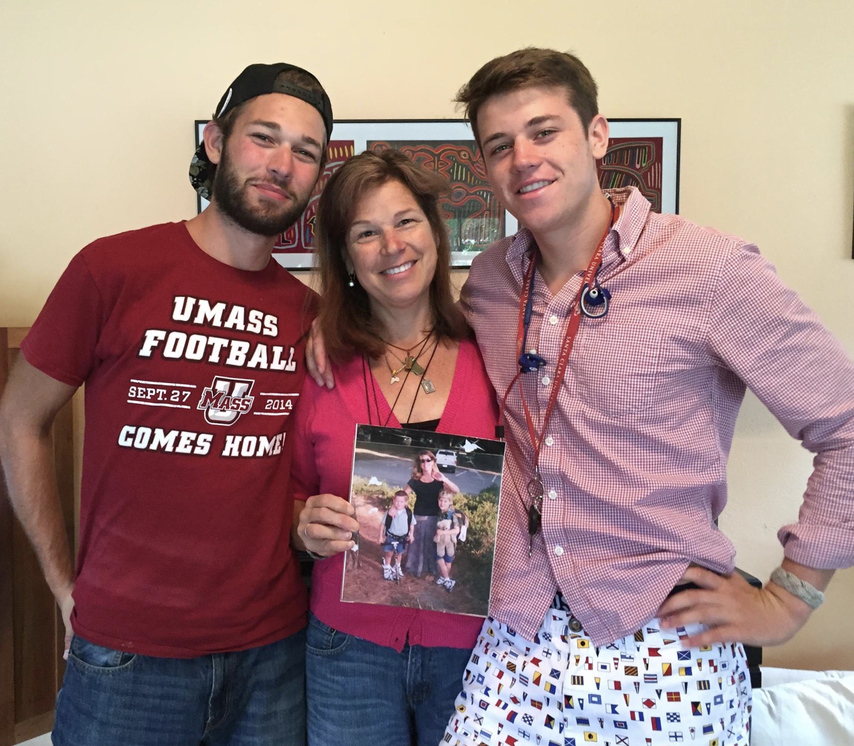 Penny Nelson with her sons James (L) and Misha (r).