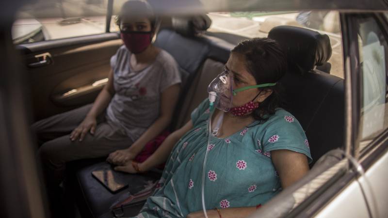 Patients infected with COVID-19 can be seen wearing Oxygen masks place amid the rising concerns over lack of Oxygen on April 24, 2021 in New Delhi, India. With recorded cases crossing 300,000 a day, India has more than 2 million active cases of COVID-19, the second-highest number in the world after the U.S. A new wave of the pandemic has totally overwhelmed the country's healthcare services and has caused crematoriums to operate day and night as the number of victims continues to spiral out of control.