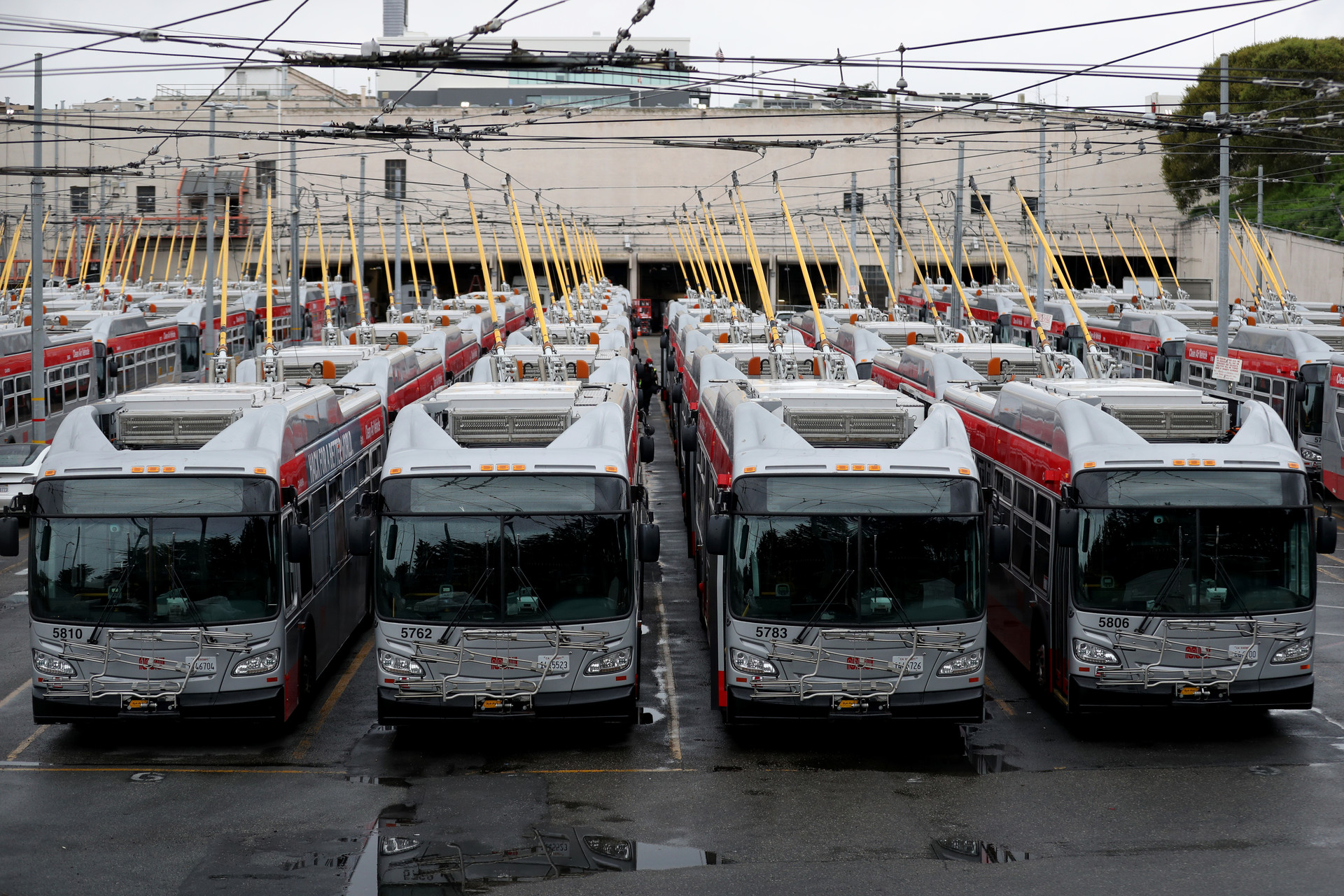 San Francisco MUNI buses sit parked at an SF Municipal Railway yard during the coronavirus (COVID-19) pandemic on April 06, 2020 in San Francisco, California. The San Francisco Municipal Transportation Agency (SFMTA) announced that they are cutting service to a majority of their 89 bus lines in the City of San Francisco as ridership plummets due to the coronavirus shelter in place. 