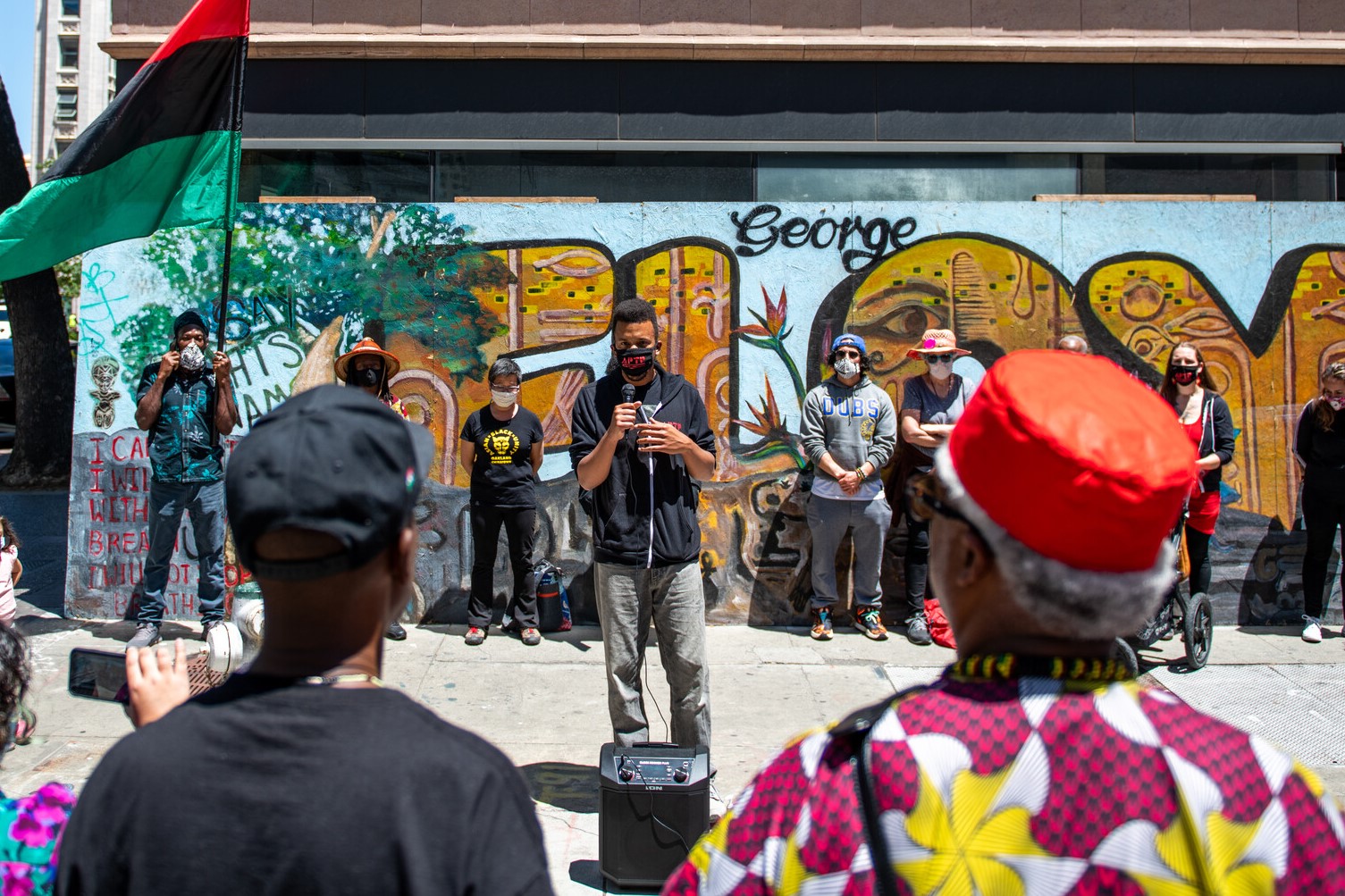 James Burch from Anti-Police Terror Project (APTP) speaks to a crowd in Oakland on May 25, 2021.