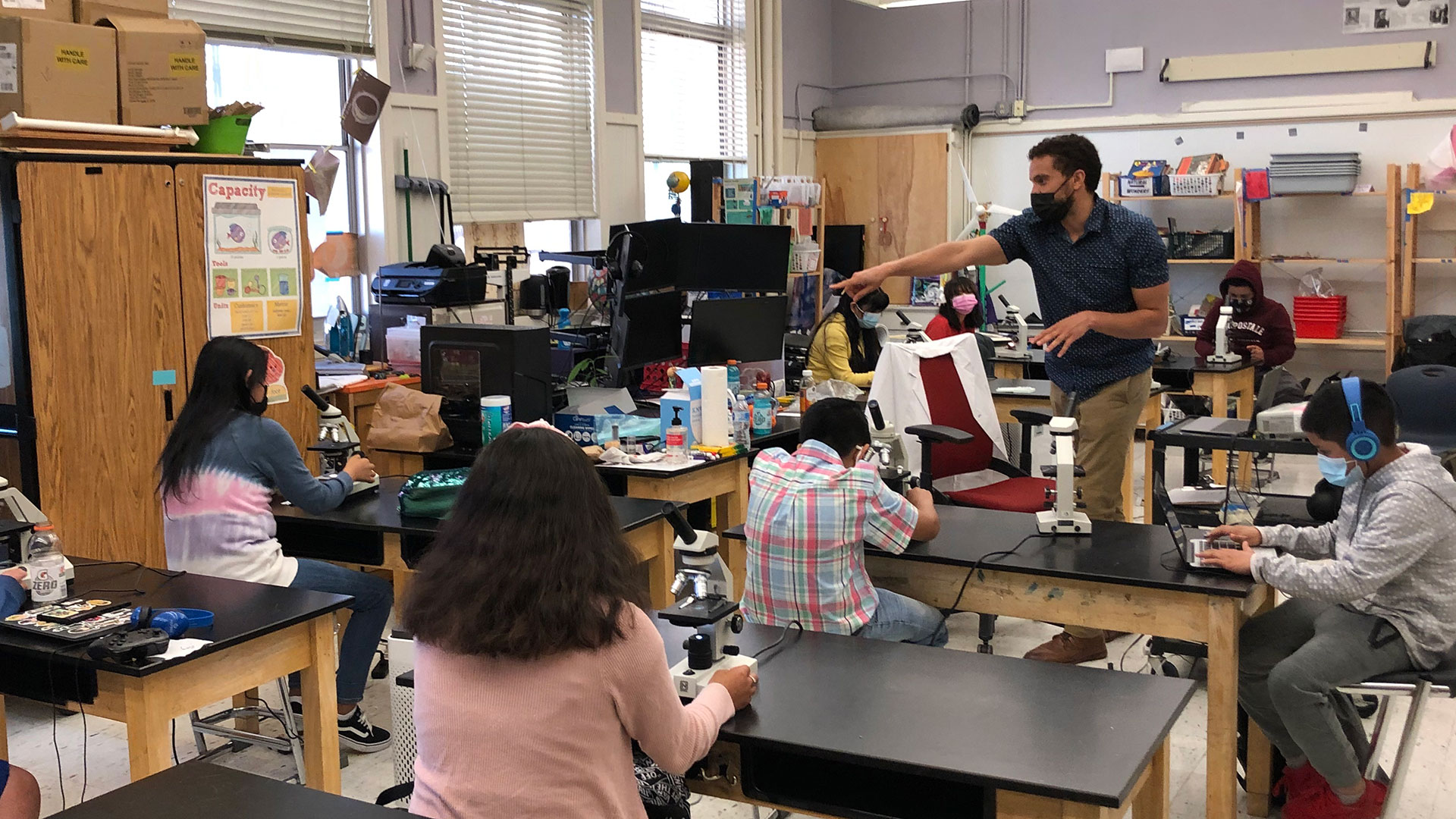 Sixth grade teacher Patrick Messac teaches a science class at Life Academy of Health and Bioscience in East Oakland. Students are studying the health impacts of air pollution and asking questions about their own exposure.