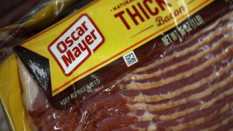 SAN RAFAEL, CALIFORNIA - FEBRUARY 22: A package of Oscar Meyer bacon is displayed on a grocery store shelf on February 22, 2019 in San Rafael, California. Kraft Heinz Co., maker of Kraft and Oscar Meyer products, reported a $12.6 billion fourth quarter loss and announced an Securities and Exchange Commission investigation into accounting policies with vendor agreements. The company also said it will cut its quarterly dividend by 36 percent. The company's stock plummeted 28 percent on the news.