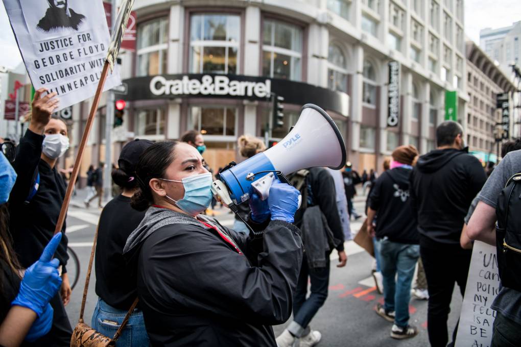Demonstrators march toward San Francisco City Hall on Sunday May 31, 2020 to protest the police killing of George Floyd in Minneapolis. Several groups marched to the Embarcadero, through Union Square and to the Hall of Justice, eventually converging and returning to City Hall.