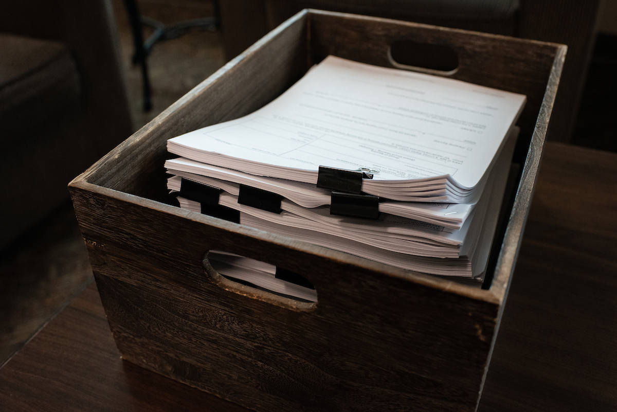 A box filled with papers.