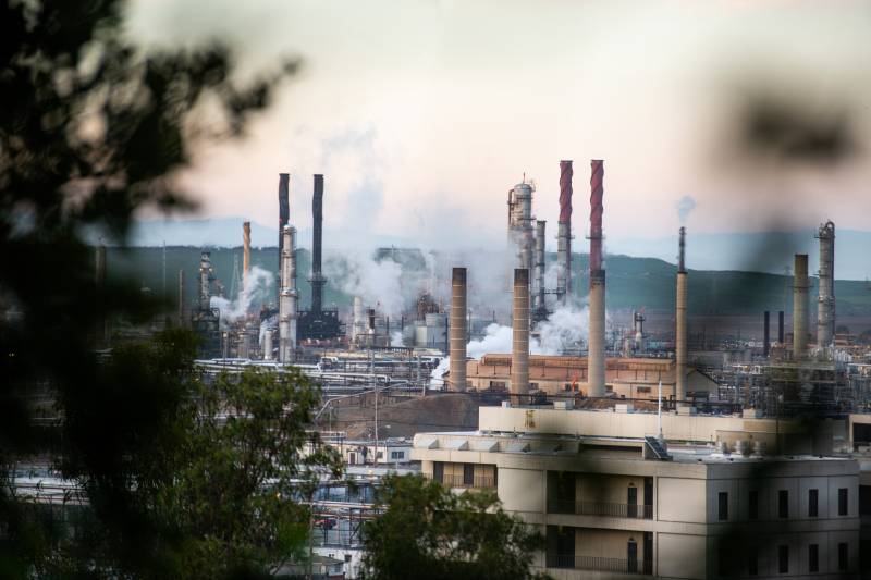 Steam rises from Chevron's oil refinery in Richmond, California.