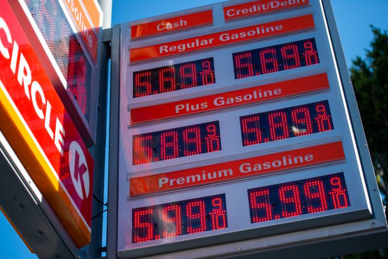 A sign shows prices at $5.69 a gallon for regular gasoline at a Circle K gas station.
