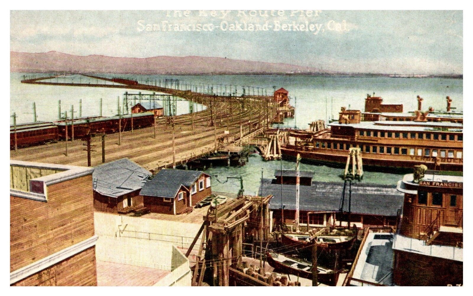 A color drawing shows ferries and other boats out in the Bay with a long stretch of rail tracks connecting back to the mainland.