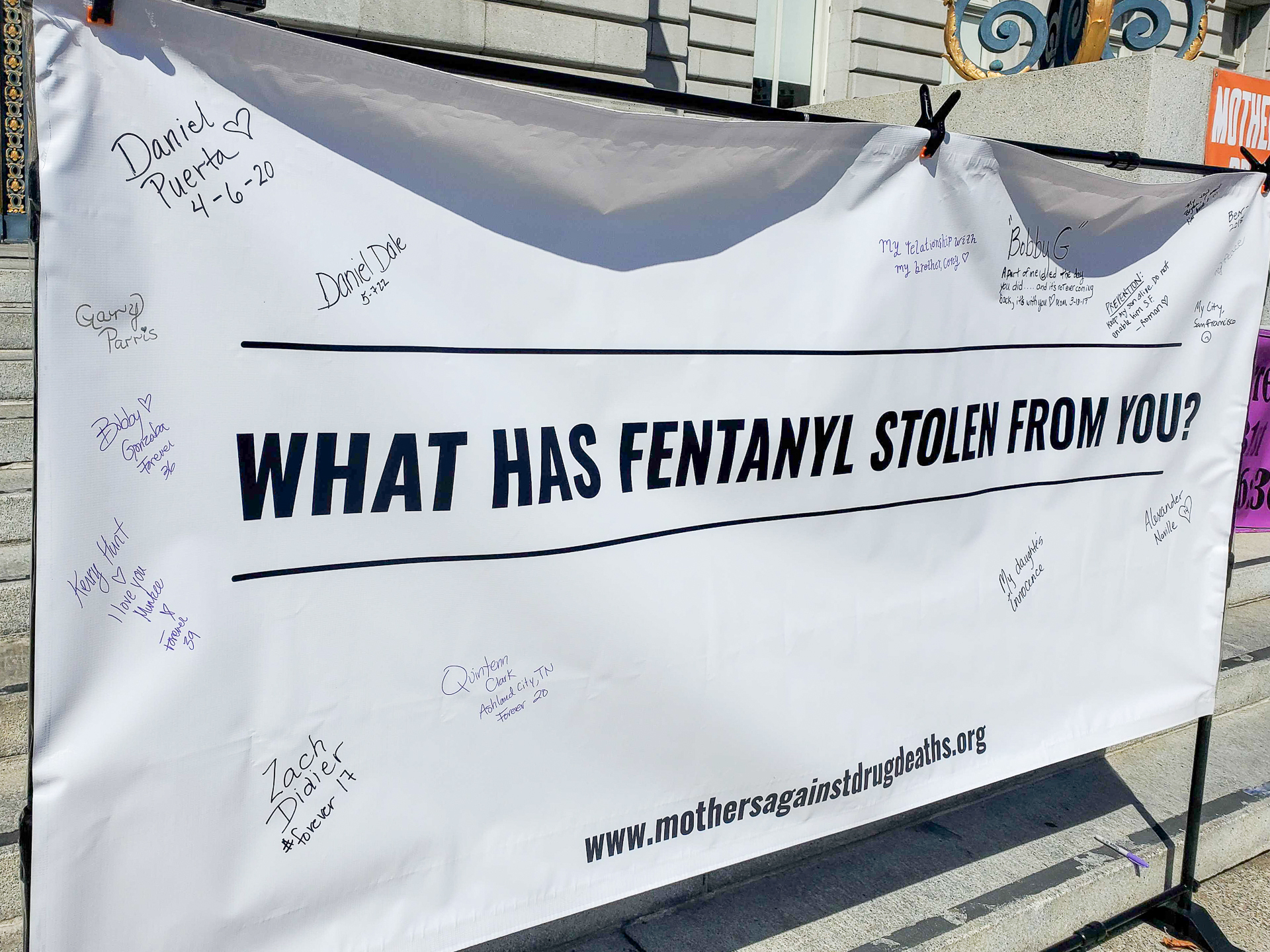a sign that reads "What has fentanyl stolen from you?"