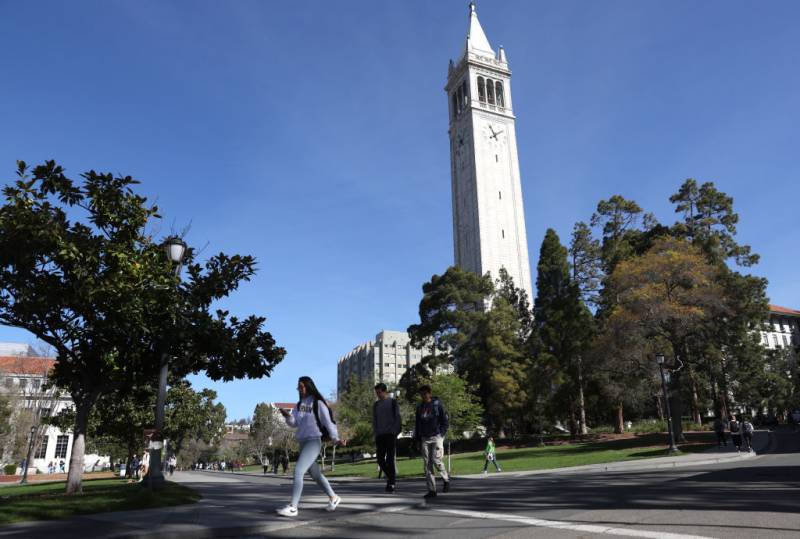 students walk on UC Berkeley's campus
