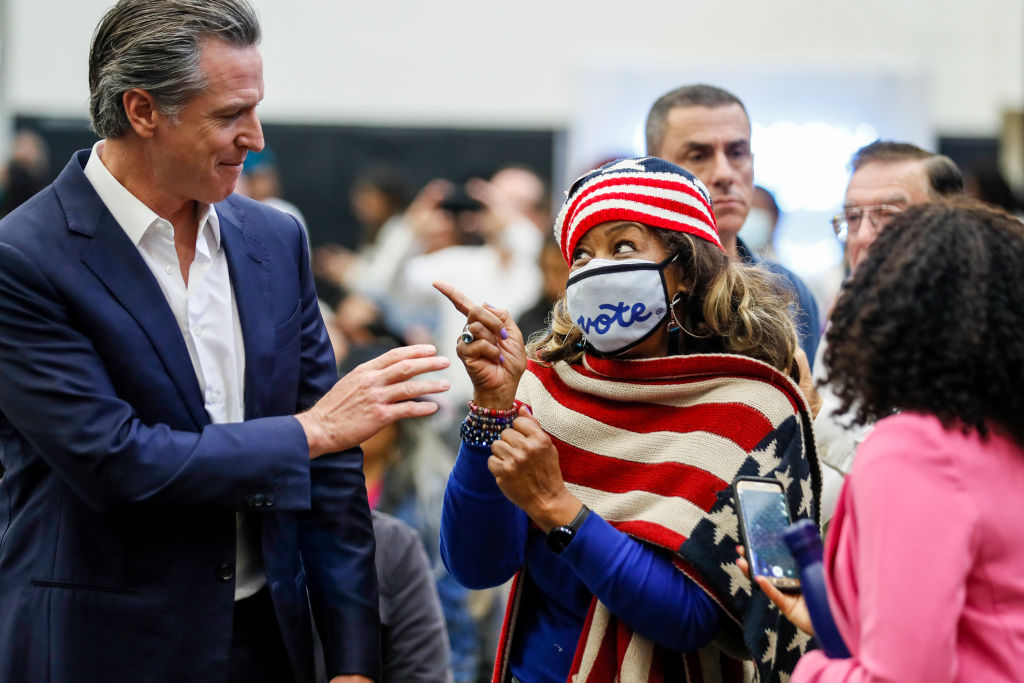 Governor Gavin Newsom greets voters at a Prop 1 rally