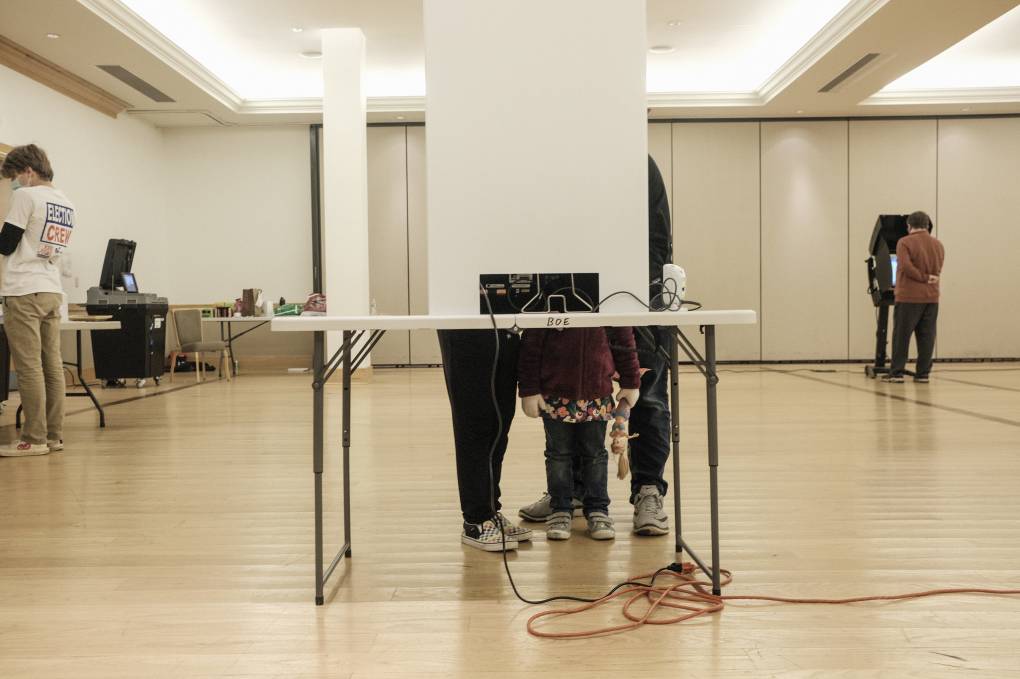 A person in a voting booth
