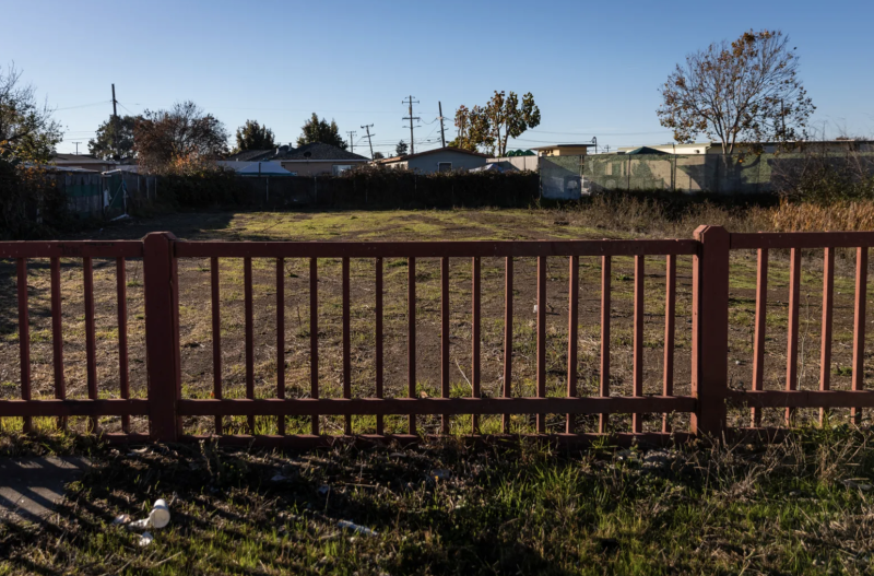 A fence outside of a property.
