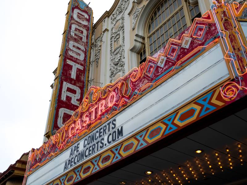 The front of the Castro Theater. On the marquee says: 'APE Concerts.'