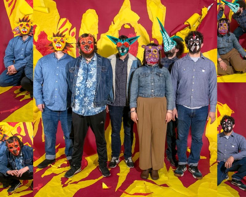 A collage showing six people wearing colorful animal masks standing in a room with a red and yellow stylish background.