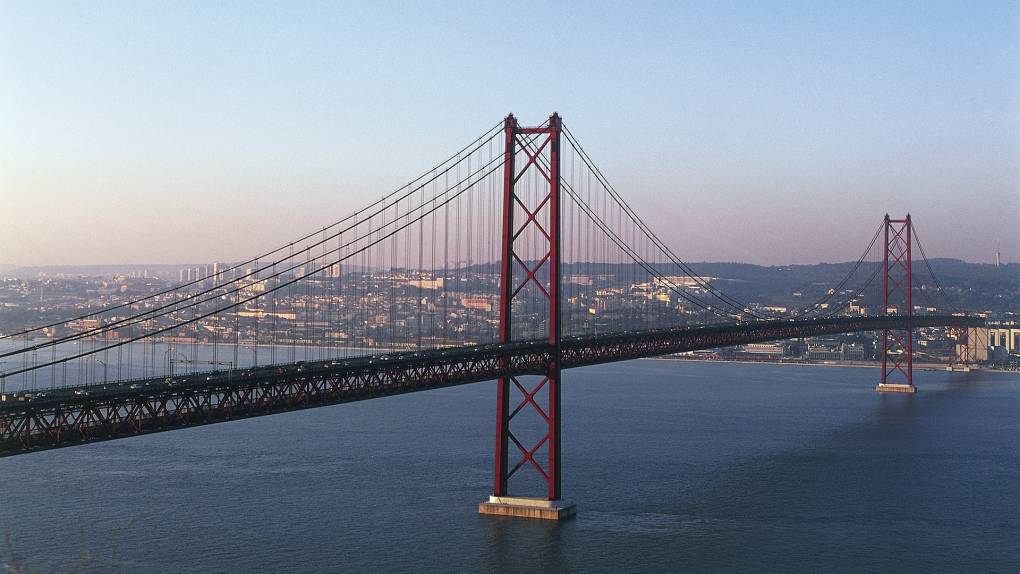 A red suspension bridge in Portugal that looks quite a bit like the Golden Gate Bridge in San Francisco.