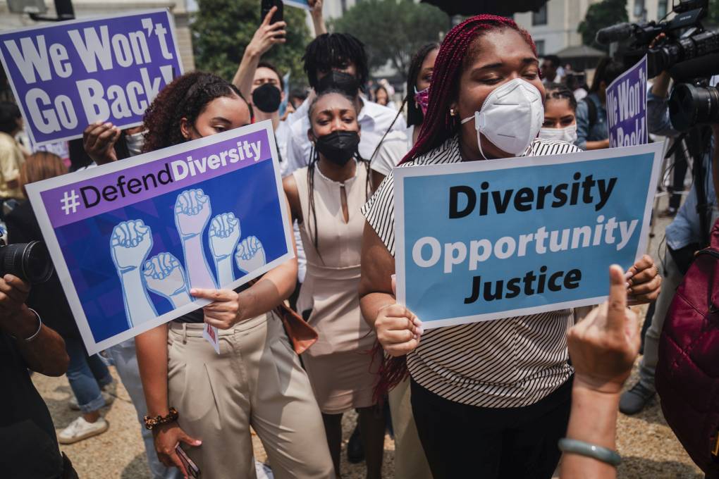Pro Affirmative Action supporters and and counter protestors shout at each outside of the Supreme Court of the United States in Washington, DC on June 29, 2023.