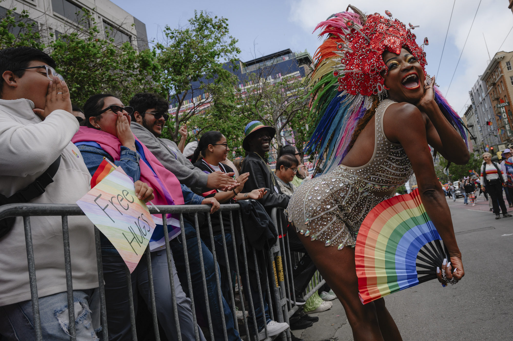 Onlookers cheer for Queen Maisa Duke as the Pride parade passes down Market Street in downtown San Francisco on June 25, 2023.