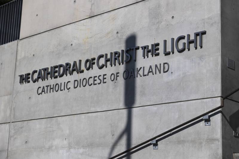 Modern lettering on a concrete wall reading The Cathedral of Christ the Light: Catholic Diocese of Oakland."