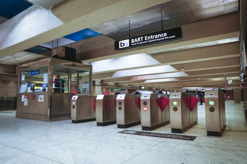 Turnstiles in a large underground facility.